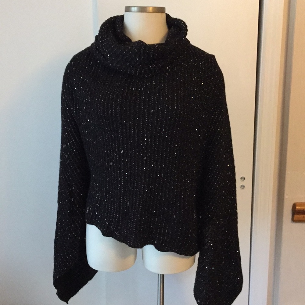 Gently worn D&Y knit poncho with sequins